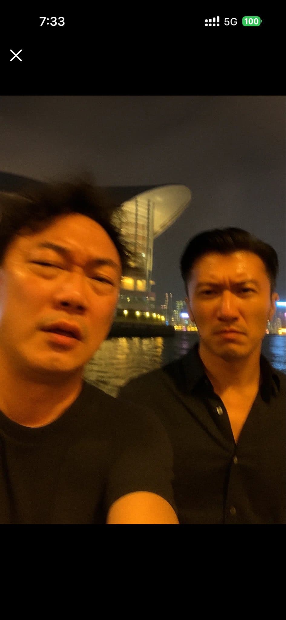 'Extremely ordinary' iPhone selfie of Eason Chan and Nicholas Tse by Victoria Harbour, Hong Kong